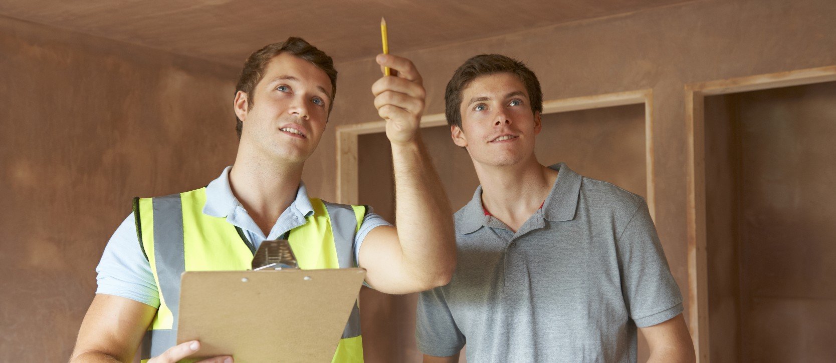 a home buyer and an inspector doing a home inspection