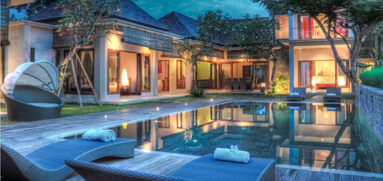 Exterior of a luxury home with a pool