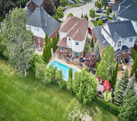 Backyard of a Whitby home with a pool