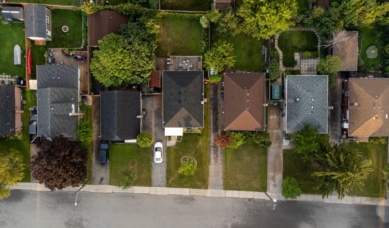 Aerial of suburban homes and street